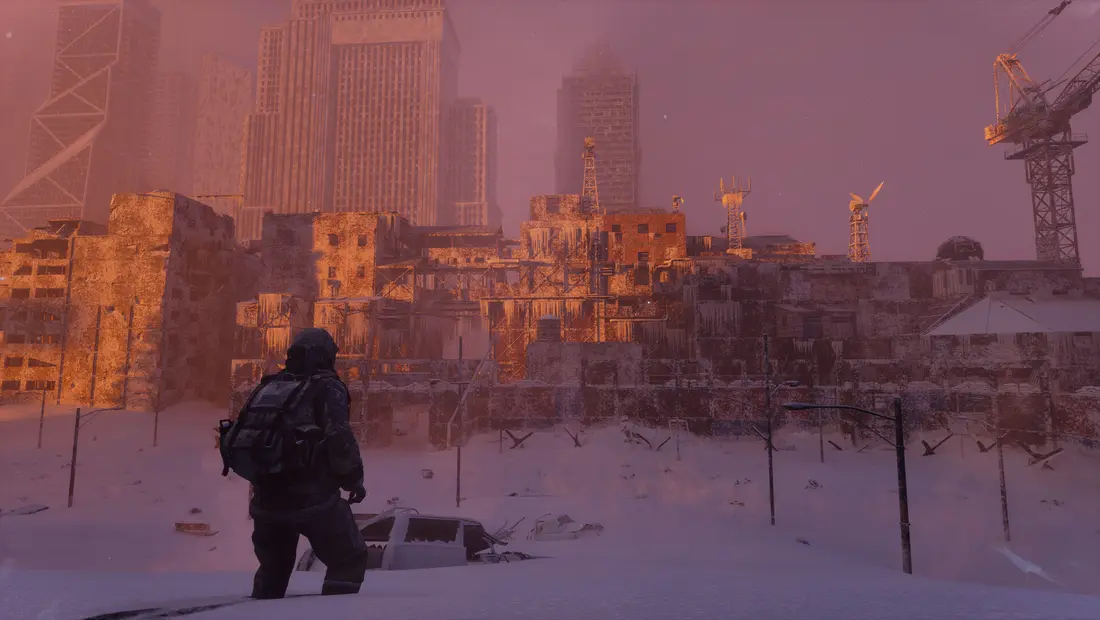A survivor overlooking a snow-buried city skyline in Permafrost