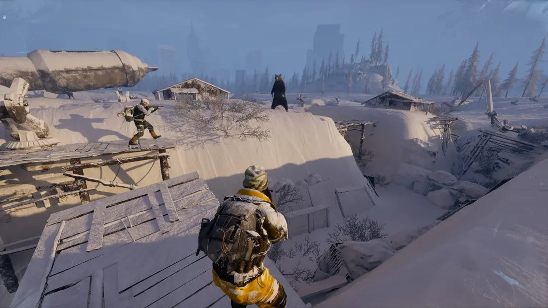 Two survivors building a shelter together in the snow in Permafrost